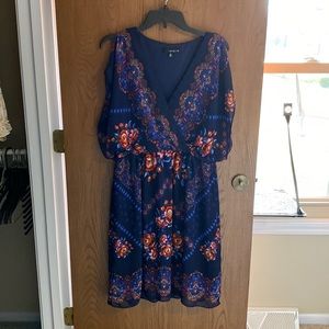 Boho style knee length navy floral dress